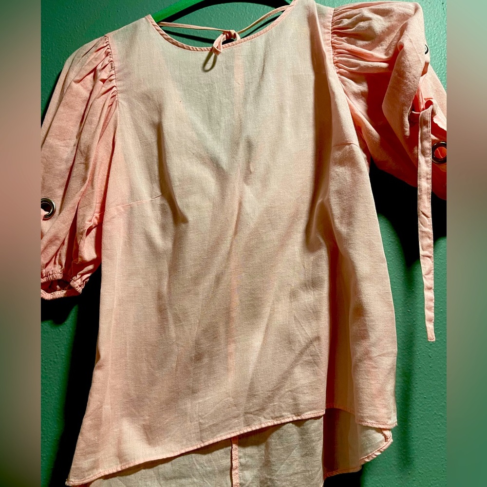 Zara top with circles in the sleeves